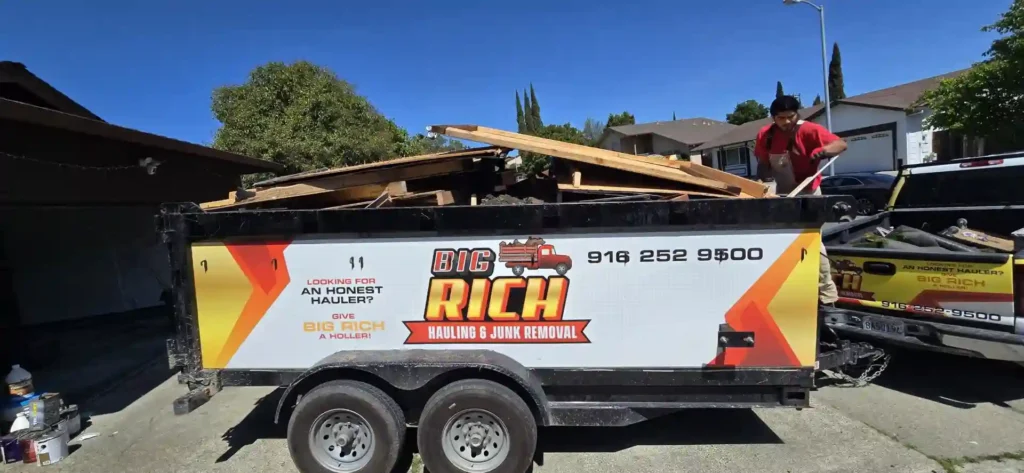 junk removal truck loaded with appliances.