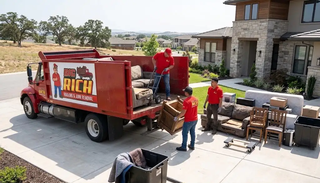 Professional crew hauling household junk from a Roseville home